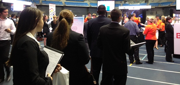 Students stand in line at the spring career showcase