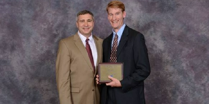 Dr. Joseph Hartman receives an award with Dr. G. Don Taylor of Virginia Tech