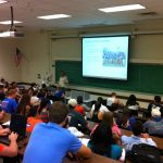 Keller delivers a lecture to students