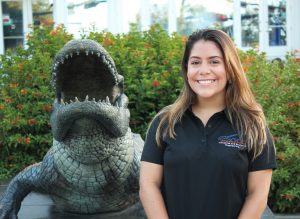 Angelica Gonzalez poses in front of the UF gator statue