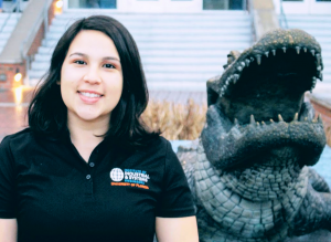 Andrea Zapata-Volkmar poses in front of the UF gator statue